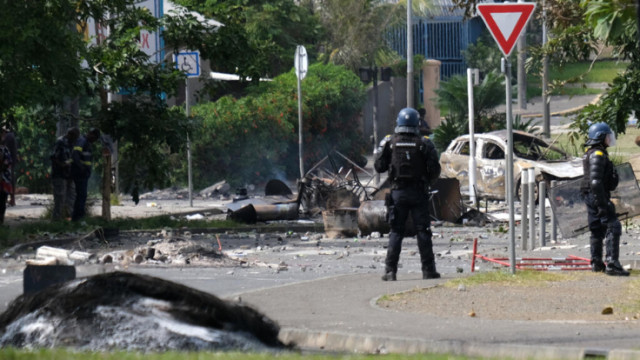 At least one person has been killed and hundreds injured in the Pacific territory of New Caledonia